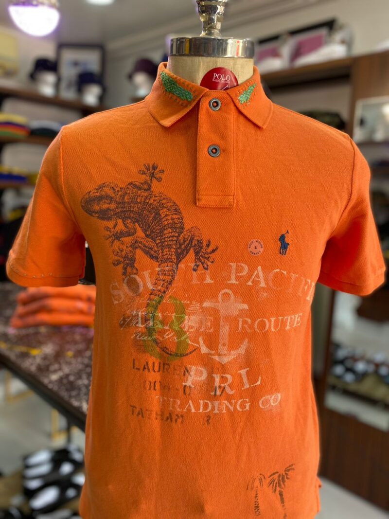 Novelty polo orange lizard print